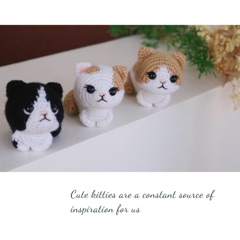 May include: Three handmade crochet cat figurines in black and white, white and tan, and tan and white. The kitties have black eyes and pink noses. The text at the bottom of the image reads: "Cute kitties are a constant source of inspiration for us."