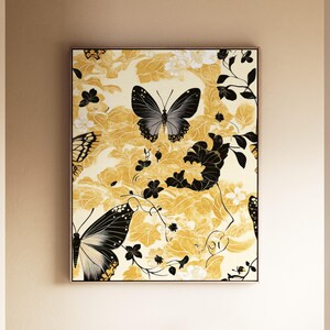 May include: A rectangular wall art print featuring a cream-colored background with a repeating pattern of black butterflies and golden-yellow floral motifs. The design includes intricate black line-drawn foliage and various butterfly silhouettes.