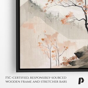May include: A framed watercolour painting depicting a misty mountain landscape with a tree in the foreground. The painting features soft pink and grey hues, creating a serene and tranquil atmosphere.