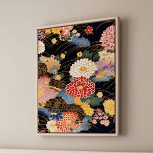 May include: A framed canvas print featuring a vibrant floral design with pink, red, white, blue, and gold flowers on a black background.