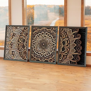 May include: A set of three ceramic mugs with a speckled, matte finish. The mugs are in shades of cream, light gray, and dark gray. Each mug has a simple, minimalist design, perfect for coffee or tea.