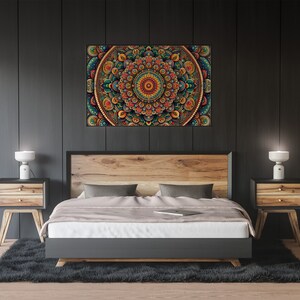 May include: A bedroom interior with a wooden bed frame and a white duvet. A colorful mandala print hangs above the bed. Two wooden nightstands with lamps are on either side of the bed.
