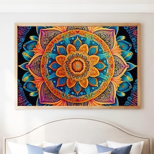 May include: A framed, vibrant mandala art print. The artwork features a symmetrical design with a central flower motif in shades of orange, blue, and purple, set against a black background. The wooden frame adds a natural touch to the colorful piece.