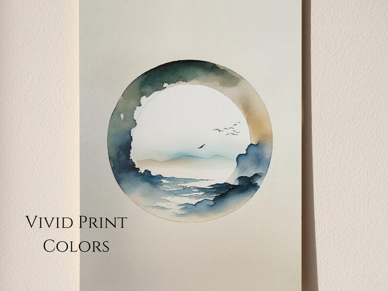 May include: Watercolor print featuring a circular landscape scene with a serene sky, mountains, and water. The artwork is framed by a dark green and blue ring, with a few birds in flight. The text "VIVID PRINT COLORS" is printed at the bottom.
