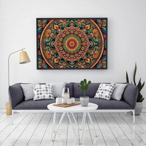 May include: A colorful mandala wall art print with intricate details in shades of orange, yellow, green, and blue. The mandala is surrounded by a black frame.