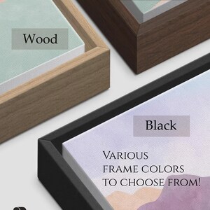 May include: A close-up of a framed print with various frame colours to choose from. The frame colours shown are wood, dark wood, and black.