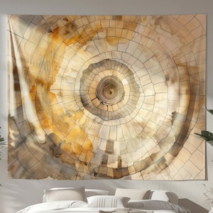May include: A large tapestry with a circular, tree-ring design. The artwork features concentric circles in shades of beige, brown, and gray, creating a textured, watercolor effect. The tapestry is hung above a bed, adding a natural element to the room.