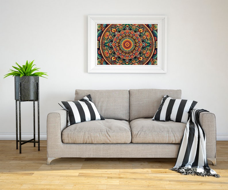 May include: A gray couch with black and white striped throw pillows and a black and white throw blanket. A white framed picture with a colorful mandala design hangs on the wall above the couch. A potted plant sits on a black metal stand to the left of the couch.