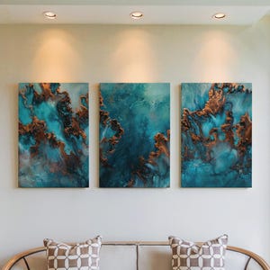 May include: Three abstract art pieces with teal and copper tones hang on a white wall. The artwork features swirling patterns and textures, creating a dynamic visual effect. The pieces are rectangular and arranged in a vertical orientation.