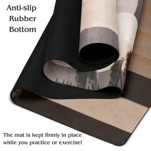 May include: Yoga mat with an anti-slip rubber bottom. The mat features a design with neutral colors and the text "Anti-slip Rubber Bottom". The text "The mat is kept firmly in place while you practice or exercise!" is also visible.