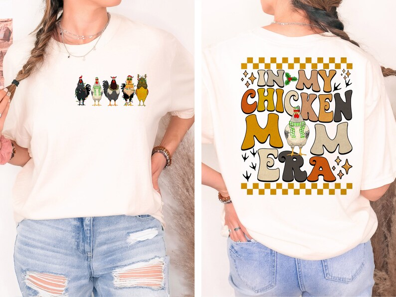 May include: A white t-shirt with a graphic of chickens and the text "In My Chicken Mom Era" on the back. The graphic is in a retro style with a checkered background.