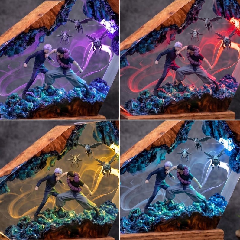 May include: A diorama featuring two anime figures in a combat pose, set within a wooden frame filled with resin. The scene includes small winged creatures and swirling light effects in purple, red, yellow, or white, set against a rocky base.