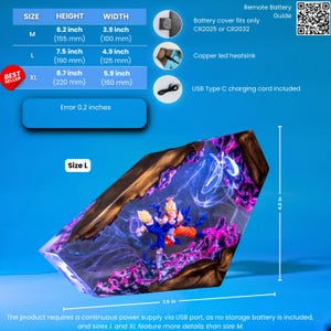 May include: A decorative resin lamp featuring two anime figures in a dynamic combat pose, encased in a clear, angular block with dark, textured edges and vibrant purple and blue internal lighting effects. Includes size charts and technical specs.