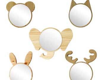 May include: A set of five circular wall mirrors framed in light-colored wood, each featuring a unique animal-shaped silhouette including a bear, a cat, an elephant with a trunk, a rabbit with long ears, and a deer with branched antlers.