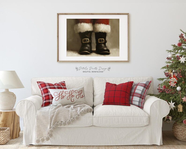 May include: A digital print of Santa's boots with the text "Ho Ho Ho" on a white couch with red and black plaid pillows.