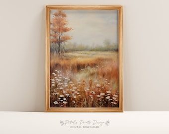 May include: A framed watercolor painting of a field with a single tree in the background. The field is filled with white flowers and the background is a hazy blue. The painting is in a wooden frame.