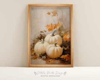May include: A framed painting of three white pumpkins with brown stems, surrounded by fall leaves in shades of orange and brown. The background is a soft, muted gray.
