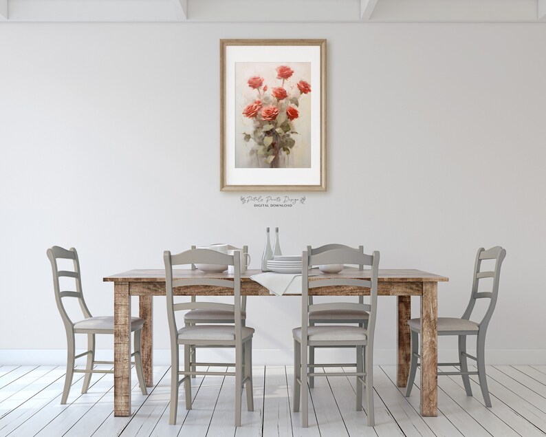 May include: A rustic wooden dining table with four gray chairs and a framed print of a bouquet of red roses hanging on the wall behind the table.