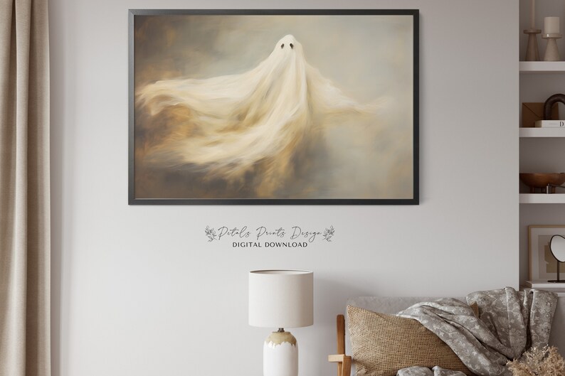 May include: A digital download of a printable art print featuring a white ghost with a flowing sheet, set against a soft, muted background of brown and grey.