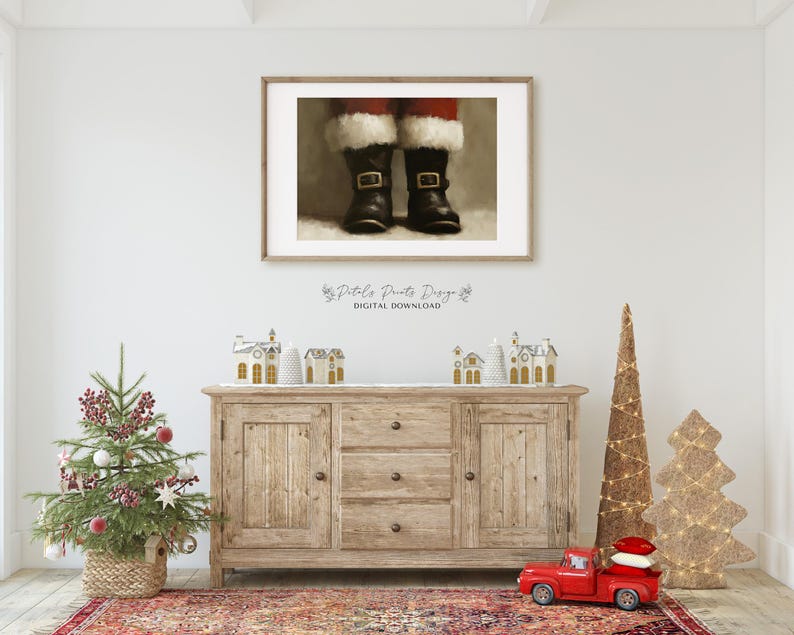 May include: A digital download of a printable art print featuring a close-up of Santa's boots. The boots are black with white fur trim and buckles. The background is a light brown color.