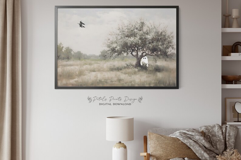 May include: A digital painting of a white ghost standing in a field under a tree. Two black witches fly in the distance. The painting has a soft, muted color palette.