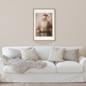May include: A digital download of a vintage-style illustration of Father Christmas wearing a red suit and a white beard. The image has a faded, textured background.