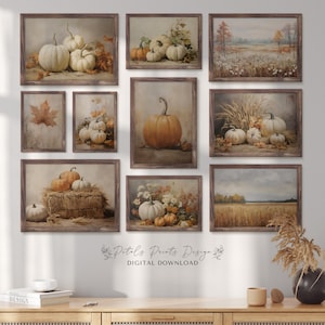 May include: A set of 10 digital printable wall art featuring fall-themed images of pumpkins, wheat fields, and autumn leaves. The prints are in a rustic style with a brown wood frame.