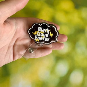 Black Cloud Energy Shaker Badge Reel: Funny ID Badge