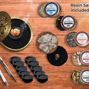 May include: An incense burner set with a decorative brass lid, a set of charcoal holders, and various resin samples in small tins. The image includes tongs and the text "Resin Sampler included FREE".