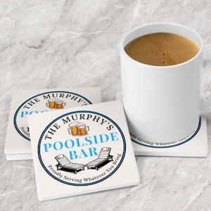 May include: White ceramic coasters with the text "The Murphy's Poolside Bar" in a blue and black circular design. The coasters feature images of beer mugs and lounge chairs. A white mug filled with coffee sits on a coaster.