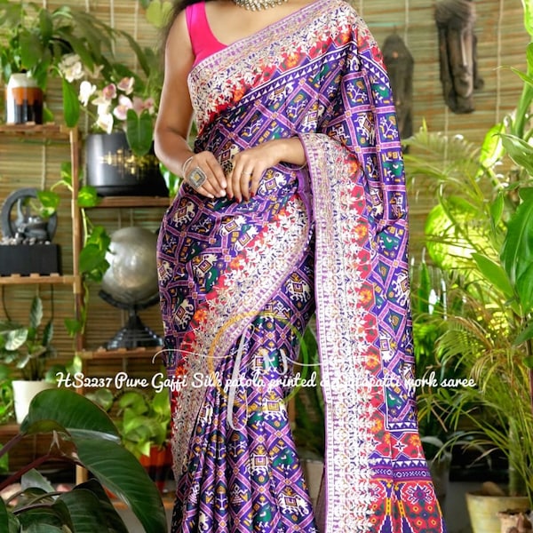 Stupendous Magenta Woven Zari & Printed Patola Silk Traditional Saree