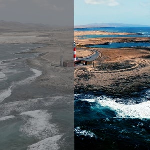 May include: An aerial view of a red and white lighthouse on a rocky peninsula. The lighthouse is surrounded by a winding road and a small body of water. The ocean is a deep blue color with white waves crashing on the shore.
