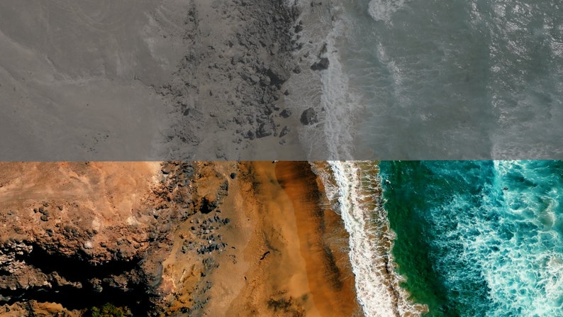 May include: Aerial view of a rocky coastline with a sandy beach and turquoise ocean waves crashing on the shore.
