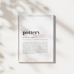 May include: Black and white typography poster with the word "pottery" defined as a therapeutic practice involving the art of shaping clay. The text includes the phonetic pronunciation of the word "pottery" and a description of the benefits of pottery.