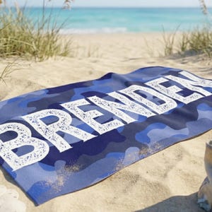 Blue personalized beach towel Brenden on sand, summer present boy bath wrap personalized name gift custom summer camp birthday favor pool party gift for little boy