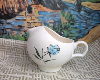 Vintage bulbous creamer with blue thistle, Stetson