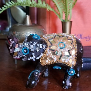 Vintage elephant with mirror, wire and beading, made in India, black, gold, turquoise, white and red.