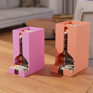 May include: Two battery storage containers, one pink and one orange, with a slot for inserting batteries. The containers are filled with AA batteries.