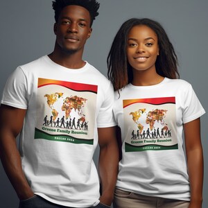 May include: White t-shirt with a graphic design of a world map with a silhouette of people walking across it. The text "Greene Family Reunion Dallas 2024" is printed below the map.