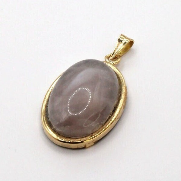 Pendentif en or jaune orné d'un cabochon de Quartz rose