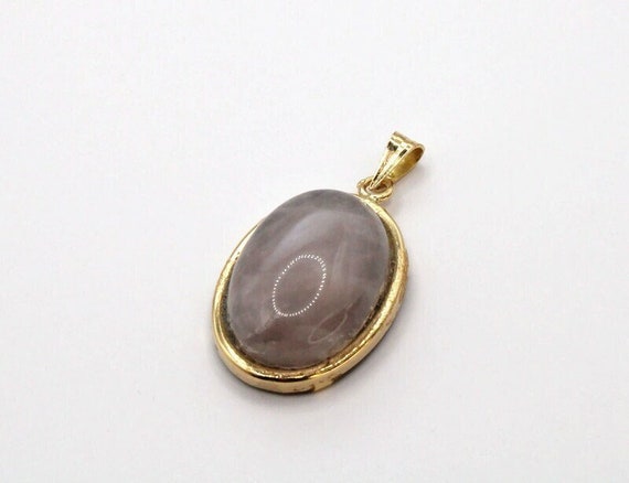 Pendentif en or jaune orné d'un cabochon de Quart… - image 1