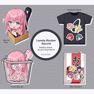 May include: A set of four double-sided acrylic keychains featuring a cartoon character with pink hair. The keychains are based on the anime "Kessoku Band" and feature the characters Bocchi, Hitori, Nijika, and Ikuyo. The keychains are designed in a cute and colorful style.