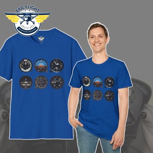 May include: A royal blue t-shirt featuring a graphic of six aircraft instrument panels. The panels are black with white and yellow markings. The t-shirt is being worn by a person with a fair complexion and short brown hair.