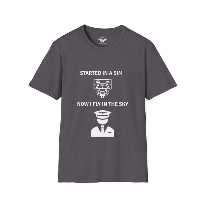 charcoal colored shirt with the text Started in a Sim Now I Fly in the Sky Shirt has a picture of a computer monitor with a yoke in front of it and an airline captain pilot