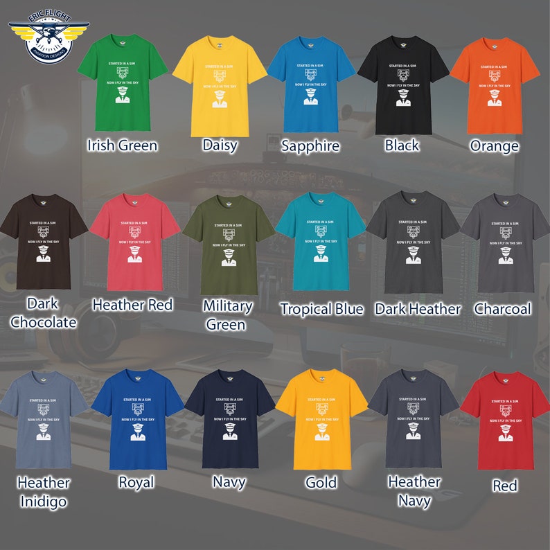 picture shows the many colors of the softstyle unisex tshirt with the text Started in a Sim Now I Fly in the Sky Shirt has a picture of a computer monitor with a yoke in front of it and an airline captain pilot