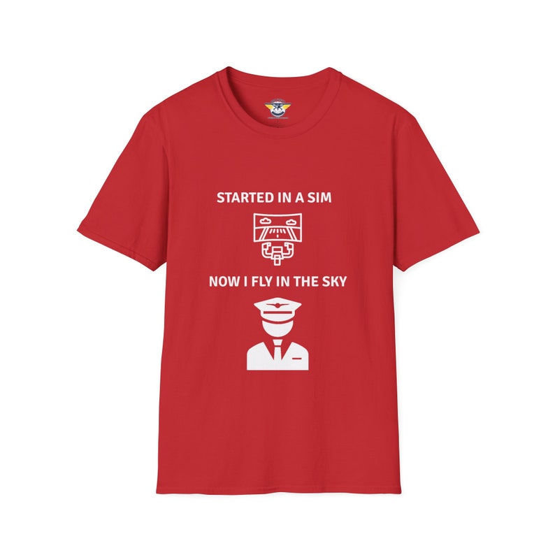 red colored shirt with the text Started in a Sim Now I Fly in the Sky Shirt has a picture of a computer monitor with a yoke in front of it and an airline captain pilot