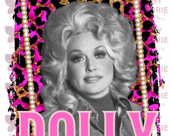 May include: A black and white photo of Dolly Parton in a pink and black leopard print frame with gold glitter accents. The frame is decorated with white rhinestones. The word "DOLLY" is written in large pink letters below the photo.