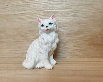 Small Vintage Long Haired White Cat