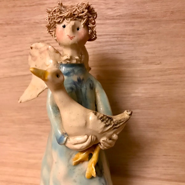 Vintage Clay Angel Holding Duck Figurine