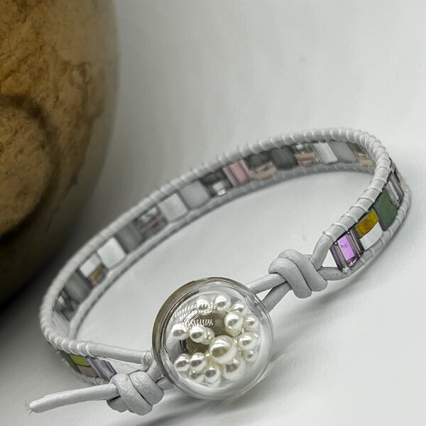 Handmade Boho Style Multicolor Japanese Tila Bead White Genuine Leather Cord Beaded Bracelet With Pearl Button Closure.